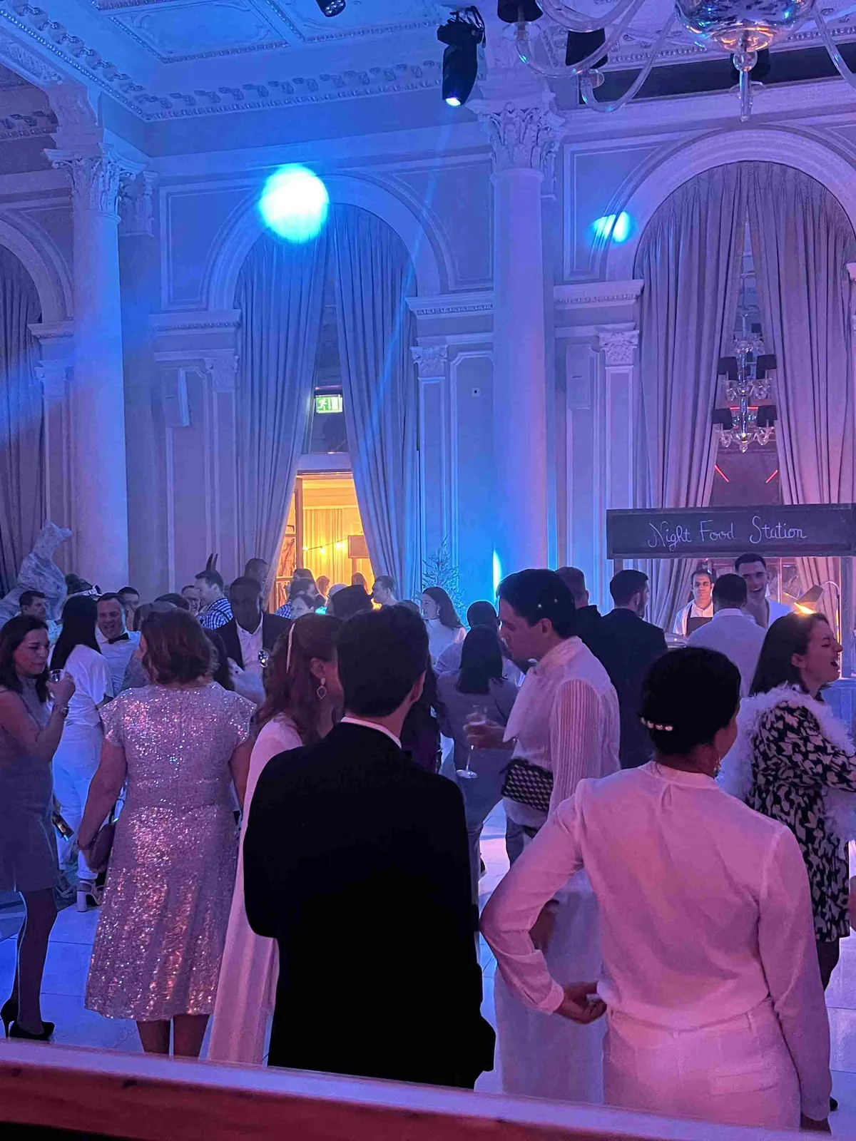 Black tie event DJ in a chandeliered ballroom